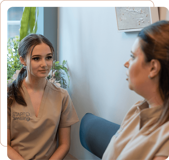 Start Smiling team member speaking with a patient